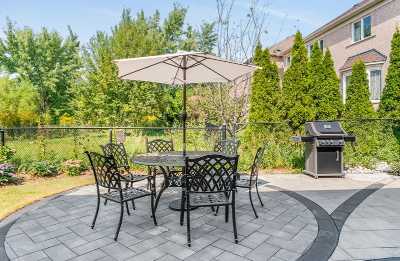 Interlock patio set up with seating and a table for outdoor entertaining